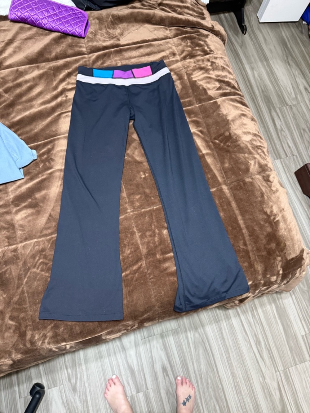 Woman’s size 8 lululemon athletica Black Flared Pants with Colorblock Waistband